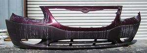 Picture of 2001-2007 Chrysler Voyager base model; garnet red impregnated Front Bumper Cover