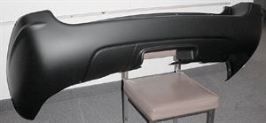Picture of 1999-2004 Jeep Cherokee/Wagoneer (full Size) Grand Cherokee Limited/Overland; w/hitch bezel Rear Bumper Cover