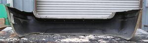 Picture of 1999-2004 Jeep Cherokee/Wagoneer (full Size) Grand Cherokee Limited/Overland; w/o hitch bezel Rear Bumper Cover